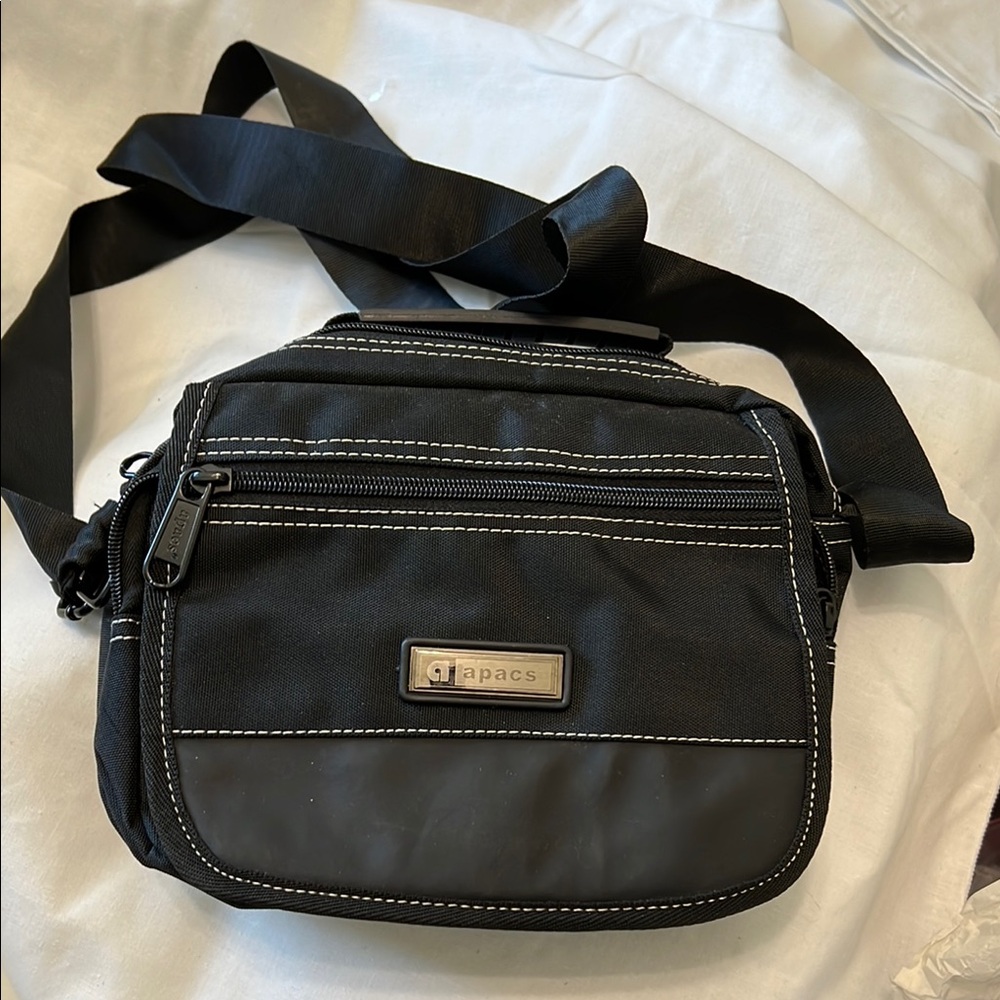 Black Messenger Bag with Adjustable Strap and Sleek Design